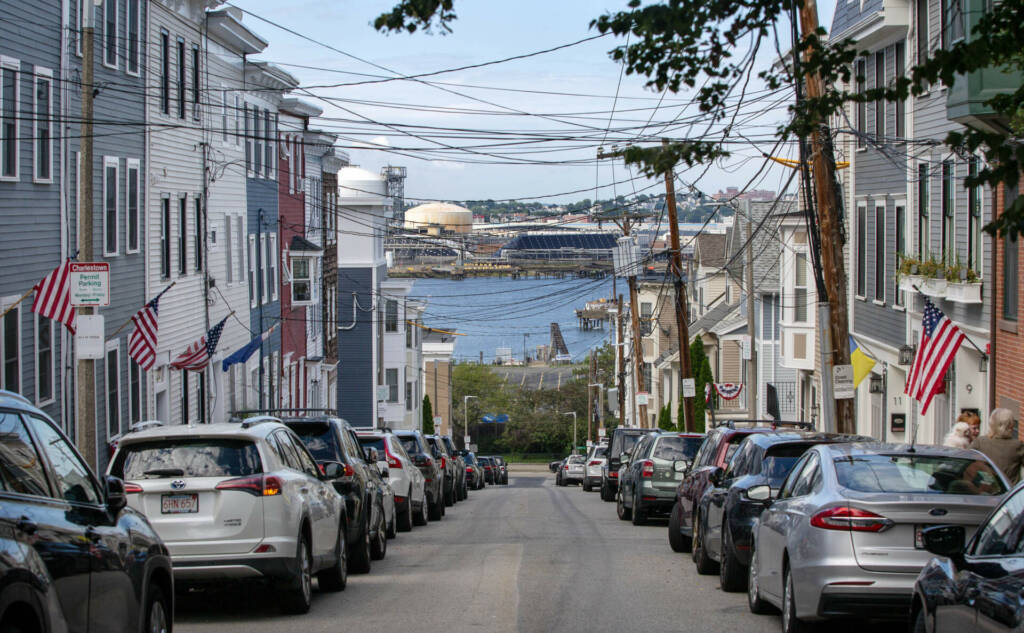 Belmont Street is adorned with flags and cables, extending from Charlestown across the Mystic River to Everett. Photo by Robin Lubbock 